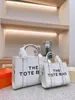 Designer in pelle The Tote Women Men Halta qualità borsetta di alta capacità Shopping Letter Stucco a tracolla quadrata M1