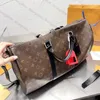 Классические дизайнерские сумки Duffel для мужчин Женщины на открытом воздухе багажная багажная леди роскошная сумка джентльмен спорт на сумке с большими мощностью сумочки 50 см.