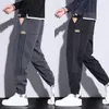 Męskie dżinsy Casual dla mężczyzn Harem zwężane spodnie czarne elastyczne buty Cut 2023 Trend szerokie nogawki proste Slim Fit workowate męskie spodnie kowbojskie