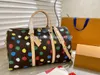 Totes Onhego MM Sac fourre-tout Sac à bandoulière Dream Bags Femme Multicolore Dot Designer Tie-dyed Crossbodys Couleur Camel Antique Travel Keepall 45cm