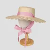 Breda randen hattar omea sommarstrån hatt fransk romantisk fluga Vete damens mode rosa band solstrand kvinnor sombrero