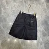 Sommar, damshortsdesigner Mode metallmärke Iron Label Casual Shorts Hög midja Smal lyxväska Strandkläder