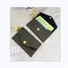 Yeni tasarımcı mektup cüzdan anahtarlık anahtarlık moda çanta kolye araba zinciri cazibesi kahverengi çiçek mini çanta lüks aksesuarlar