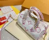 Womens Designer YK Speedy Bandouliere 25 Borsa Face Print Yayoi Kusama Borsa in pelle con ricamo facce gioiose Tote energia ottimista Borsa a portafoglio M46426