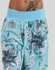 Pantalon femme décontracté pantalon à revers mode d'été 2023 poche imprimé fleuri bouton décor femme vacances taille basse