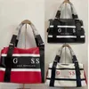 حقائب Guss Guss Travel Bag Usisex Duffle Color Letters LARGE CARCED LAGGAGE LIGAGE BAG 220806