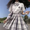 Vestidos de trabalho estilo universitário colegial uniforme japonês JK manga curta estudante camisa bordada Kawaii plissada xadrez minissaia conjunto de 2 peças