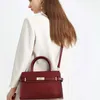 2023 nouveau sac de marque de luxe léger femme d'âge moyen femme sac tempérament grande capacité en cuir sac de mariage mère sac à main