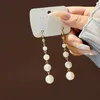 Wholesale of high-end pearl earrings, silver needles retro small fragrant wind colored diamonds eight pointed star earrings and earrings