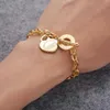 Gioielli famosi Le donne adorano i braccialetti Braccialetti in acciaio inossidabile con cuore in oro per il regalo della festa di compleanno