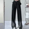 Jeans da donna Gradiente nero Irregolare Trendy High Street Stile Harajuku Design largo Sense Fashion Pantaloni a gamba larga con fascia piccola