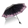 Paraguas estilo artístico para niñas universitarias hermosa flor que florece en el agua paraguas pequeño y portátil para protegerse del viento