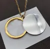 Fashion Luxury Uomo Donna Fascino Collane con ciondolo lungo Lettera Superficie a specchio Fascino Oro argento Colore pendenti a catena Gioielli