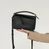 Designer tas 2023 nieuwe mini ruitvormige zachte lederen geometrische tas splicing draagbare grote capaciteit kussen tas schoudertas