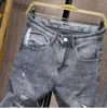 Jeans da uomo Uomo Strappato Skinny Grigio Elasticità High Street Wear Leggero Hip Hop Sfilacciato Homme Patchwork Biker Pantaloni da uomo in denim