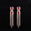 Boucles d'oreilles pendantes YFJEWE 2023 mode femmes rouge gemme qualité autrichien gland conception longue robe formelle dames boîte de nuit cadeaux E060