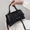 2023 B modèle de crocodile haut de gamme prix des matières premières cuir de crocodile sablier classique sac à main en cuir véritable messager d'épaule de mode européenne et américaine