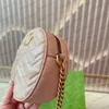 Bolso de lujo Bolso bandolera clásico Bolso de diseñador Bolso de cadena de oro para mujer Bolso de pastel redondo de moda Bolso de cuero Bolso de hombro de alta calidad Bolso compacto delicado bliberryeyes