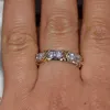 Venta al por mayor profesional Eternity Diamonique CZ diamante simulado 10KT blanco amarillo oro relleno boda banda anillo cruzado tamaño 5-11