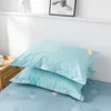 Set di biancheria da letto 2023 Lenzuolo a quattro pezzi in cotone a fiocco lungo Motivo a stella e luna Modelli di lusso leggeri chiari Blu denim