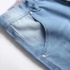 Jeans Masculino Moda Streetwear Masculino Rasgado Estilo Grã-Bretanha Calça Masculina Denim Marca Clássico Calça Lápis Esticada Magra Azul