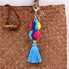 Portachiavi a forma di palla di pelliccia colorata bohémien Portachiavi con nappa di peluche intrecciata Portachiavi con ciondolo a forma di borsa da ragazza