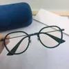 Óculos de sol 2023 Novos óculos circulares de internautas de alta qualidade para mulheres na versão coreana Face Slimming Anti -azul 0691
