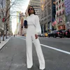 Jumpsuits för damer Rompers Turtleneck lykta ärmar löst sittande dam jumpsuit Tunika vida ben Flare byxor elegant topp gul vit svart kombination 230710