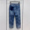 Pantalons de jeans de créateurs pour femmes avec chaîne en métal Badge Denim Pantalon Fille Lady Street Style Pantalon