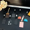 Designer Tassen Bruin Brief Sleutel Portefeuilles Luxe Geruite Pompoen Kaarthouders Portemonnees Beroemde merken Vrouwen en Mannen Clutch Bag Portemonnees Toegangscontrole Kaart Beentje