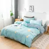 Set di biancheria da letto 2023 Lenzuolo a quattro pezzi in cotone a fiocco lungo Motivo a stella e luna Modelli di lusso leggeri chiari Blu denim