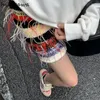 Spódnice moda damska tunika z wysokim stanem dzianinowa jupiter 2023 Faldas Mujer De Moda Chic Tassel Bodycon Mini koreańska słodka Saia