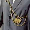 Bolsos de cintura Cinturón de cadena de diseñador de lujo para mujer Mini cintura Bolso de metal dorado Bolso ahuecado Cintura Borla Accesorios de joyería para el cuerpo 230711