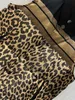 Gilet in piumino con stampa leopardata a doppia faccia da donna autunno e inverno, un metodo a due indumenti, abbigliamento economico e pratico, versione slim, leggero, caldo e alla moda.