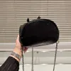 2023 High Quality Crystal Cowhide Black Women's Cowhide Backpack Small Capacity Metal Shoulder Strap Flip Pull Cord Opening Classic Casual Designer Fashion Brand