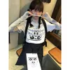 女性の Tシャツおかしい DJ 犬印刷女性グラフィック原宿半袖ルーズコットンスカイブルー夏トップス 2023 Tシャツ