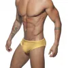 Costumi da bagno da uomo Estate Slip da bagno brillanti da uomo Bikini sexy Vita bassa Costumi da bagno glitterati Moda maschile Nylon Luminoso Sport Spiaggia Surf