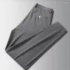 メンズパンツメンズニットストライプシアサッカープレス湿気吸収速い乾燥ズボンの夏のスリムストレートレッグカジュアル