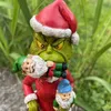 Divertido jardín verde Santa Claus comiendo gnomos figura estatua decoración creativa resina comiendo gnomos Navidad jardín decoración regalo L230620