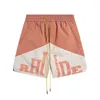 Toppkvalitetsdesigner Shorts Summer Fashion Beach Mens Womens Street Wear Red Blue Black Loose Ligthweight Rhude Mens Short European Size S-XL