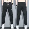 Jeans pour hommes printemps et automne 2023 Leggings Harlem polyvalent mode décontracté cheville longueur pantalon