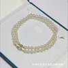 Hänghalsband europeiska och amerikanska modedesigner märke smycken klassiska populära high-end full diamant saturn pearl halsband dubbel lager halsband