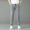 Herrbyxor Högkvalitativ hösten New Men's Business Casual Pants with Zipper Pockets Fashionabla Solid Colic Elastic Jogging Ultra-Thin lämplig Z230713