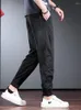 Мужские брюки Ледяные шелк Мужчины летняя прохладная сетчатая сетка Quick Drying Joggers повседневные черные легкие свободные спортивные брюки эластичные талии