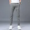 Pantaloni da uomo Primavera Estate Seta di ghiaccio Casual Classico Sottile Slim Fit Pantaloni da abito elasticizzati dritti Abbigliamento da uomo di marca