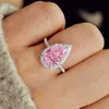 Huitan Pink/Crystal Waterdrop Cubic Zircon Rings for Women Klassisk design Eternity Bröllopsförlovningsringar Silverfärgade smycken