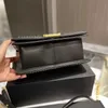 Bolsos de diseñador de lujo para mujer Bolsos de canal Bolsos de hombro Tote Nueva moda Bolso bandolera con cadena de diamantes Versátil Sobre portátil Bolsos de mano Ventas de fábrica