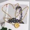 Paski damskie Runway moda złoty metalowy kwiat łańcuszek Cummerbunds damska sukienka gorsety w pasie dekoracja wąski pasek TB2404