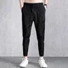 Calça masculina 2023 casual primavera verão outono corrida estudante masculina moda coreana esportes nove bolsos duplos de secagem rápida