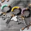 Nyckelringar Ups Party Favor Sile Cursive Cow Bead Armband Wood Disk Nyckelring Tofs Oxehuvud Handledsring Charm Hänge Drop Delivery Jew Dhzm6